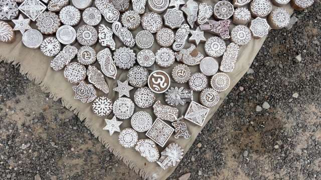 Hand-Carved Indian Wood Printing Blocks Displayed Outdoors