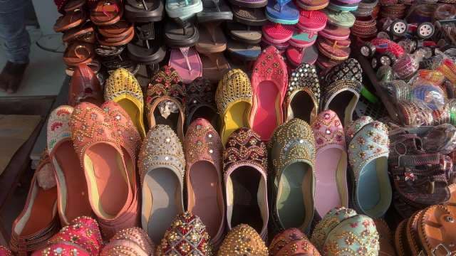 Colorful Traditional Juttis for Sale at Indian Street Market