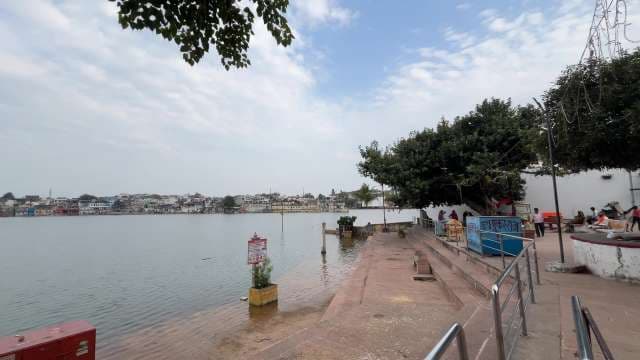 Scenic View of Sacred Lake and Ghats in Indian Town