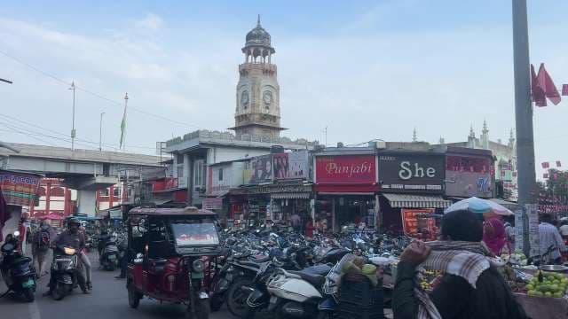 Bustling Market Scene With Iconic Clock Tower in Ajmer