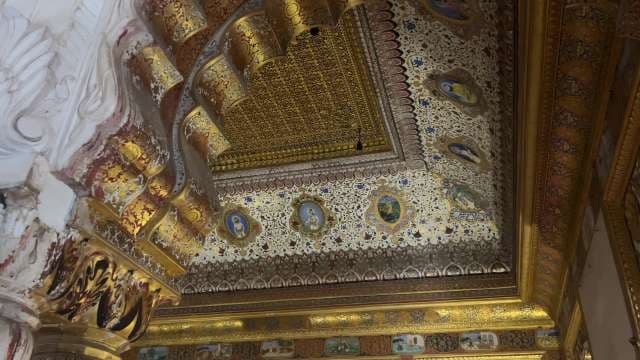 Intricate Gold Ornamental Ceiling in Historic Palace