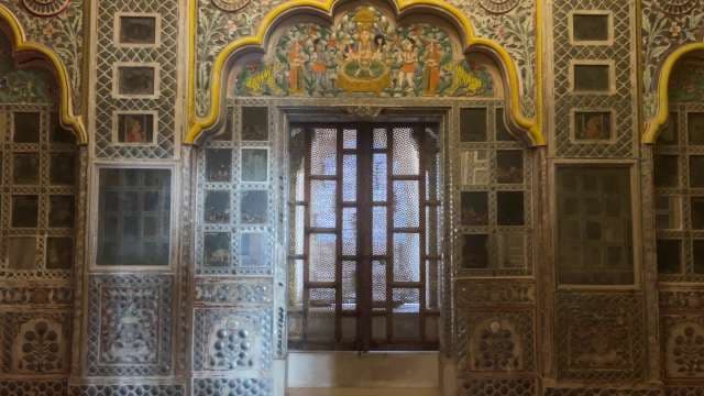 Intricate Window and Artwork Inside Historic Indian Palace