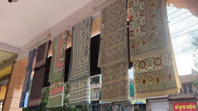 Colorful Indian Textiles Displayed in Traditional Market