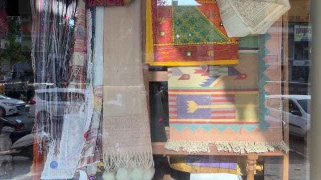 Colorful Handwoven Textiles and Shawls on Display