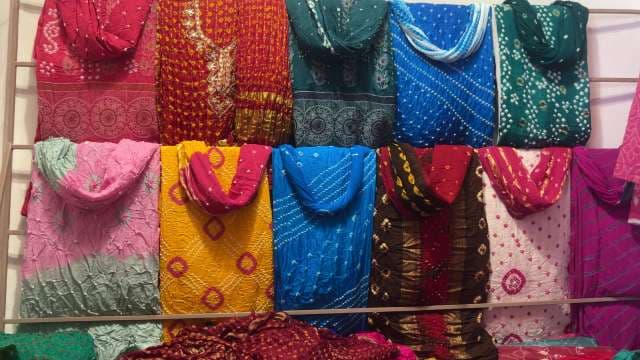 Vibrant Bandhani Sarees Displayed at Indian Textile Market
