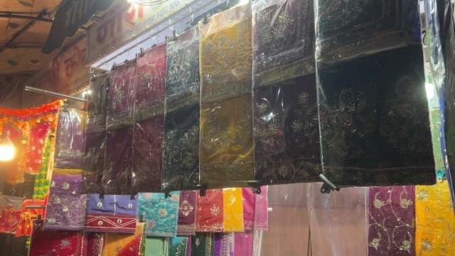 Colorful Embroidered Fabrics on Display at Indian Market