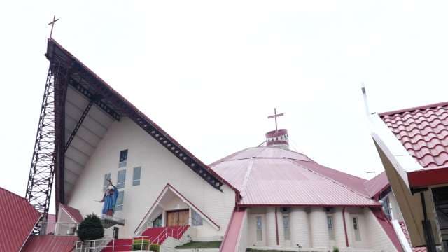 Modern Church Architecture With Distinctive Red Roofs