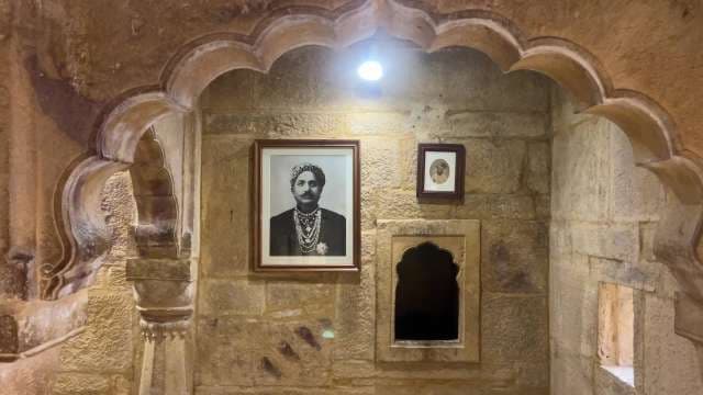 Historic Indian Palace Interior With Royal Portraits