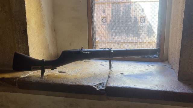 Ancient Rifle Displayed in Historic Stone Fortress Window Jaisalmer Golden Fort, Rajasthan