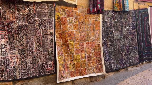 Colorful Traditional Handmade Rugs on Display in Jaisalmer