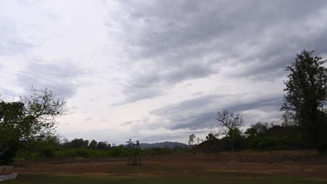 Dramatic Cloudy Sky Over Rural Landscape