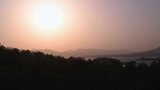 Scenic Sunset Over Misty Forest And Lake Landscape