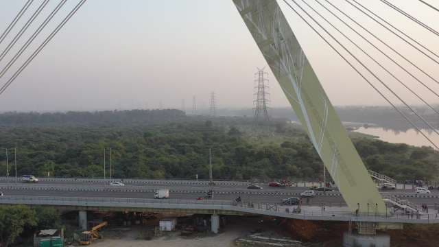 Cable-Stayed Bridge Over Yamuna River in Delhi at Sunset