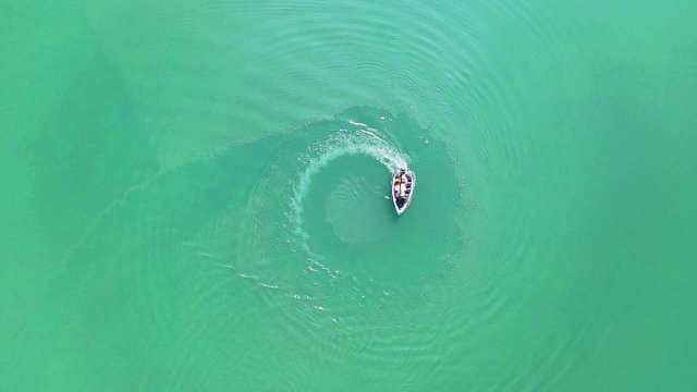 Aerial View of Speedboat Creating Circular Ripples at Tehri Garhwal
