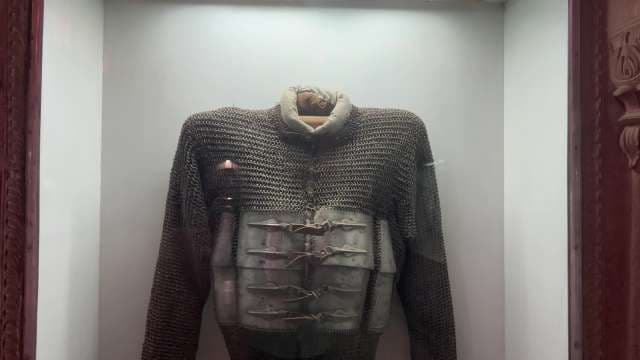 Historic Chainmail Armor Displayed in Museum Exhibit