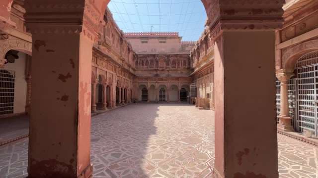 Historic Indian Palace Courtyard With Intricate Architecture