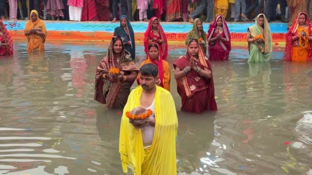 Devotees Celebrate Chhath Puja Festival in Sacred River Ritual