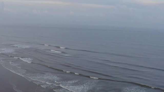 Mesmerizing Aerial Ocean Waves Crashing Ashore