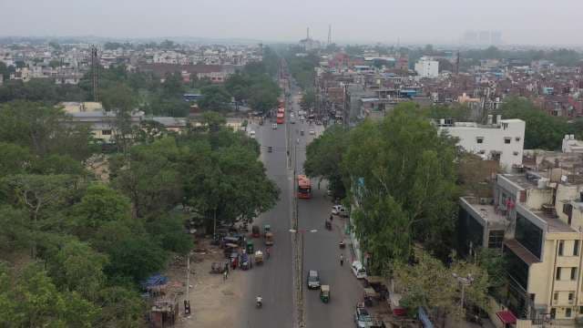 Aerial View of Bustling Urban Street Traffic