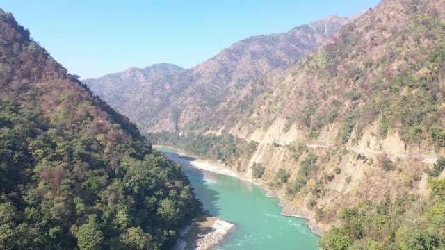 Majestic Ganges River Flowing Through Himalayan Valley