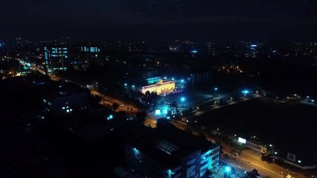Aerial Night Cityscape with Illuminated Building