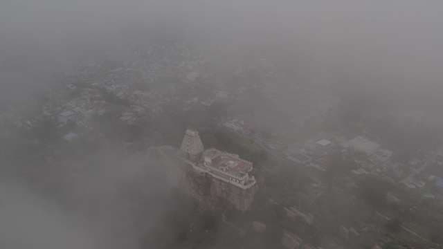 Ancient Temple Emerging From Misty Mountain Fog