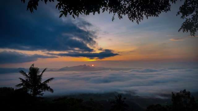 Golden Sunset Over Misty Mountains 