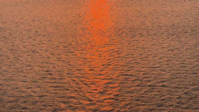 River Water Reflecting Sun Light During Sunset