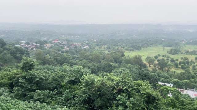 Lush Valley Landscape With Rural Village and Agricultural Fields