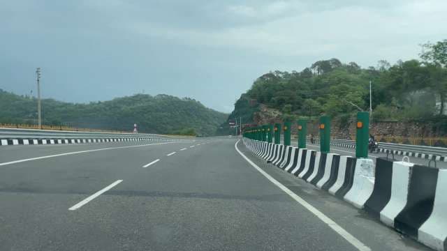 Modern Highway Through Lush Green Mountains India