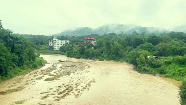 Flooded River Valley in Rain