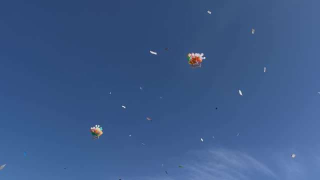 Colorful Kites Flying High in Clear Blue Sky