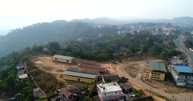 Hillside Village Development in Tropical Mountain Landscape