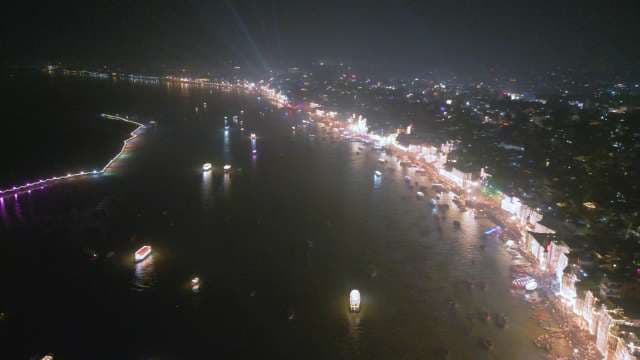 Vibrant Nighttime Waterfront City Lights Aerial View