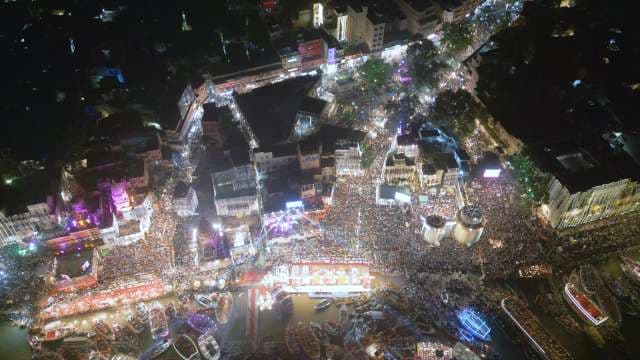 Vibrant Night Cityscape: Aerial View of Bustling Urban Streets