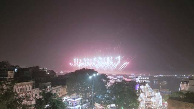 Spectacular Neon Light Show Over City Skyline at Night
