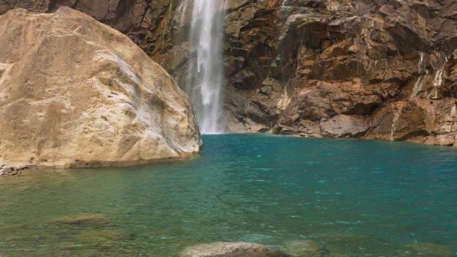 Hidden Waterfall Paradise: Rainbow Falls