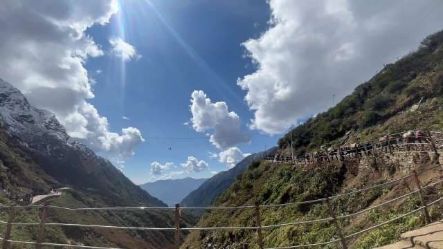 Kedarnath Trek Devotees Carried in Doli on Mountain Path