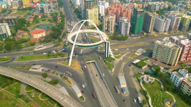 Modern Urban Cityscape with Iconic Arch Bridge Monument