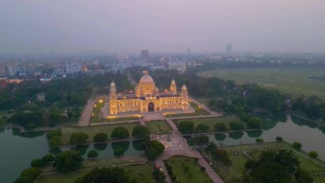 Stunning Aerial View of Illuminated Victoria Memorial Hall at Dusk
