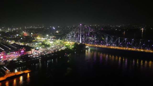 Stunning Aerial Night View of Howrah Bridge in Kolkata India