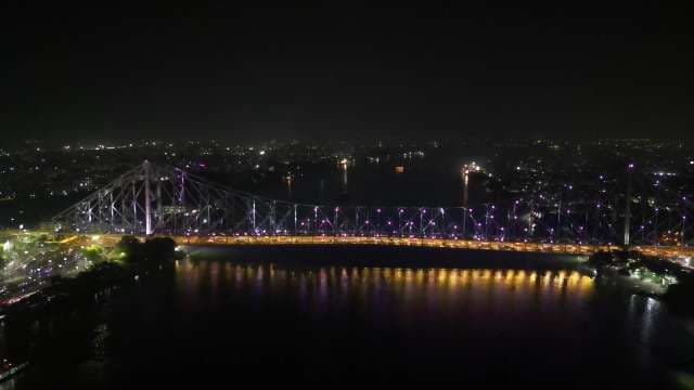 Stunning Night View of the Iconic Howrah Bridge in Kolkata India