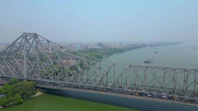 Iconic Howrah Bridge Aerial View Over the Hooghly River in Kolkata