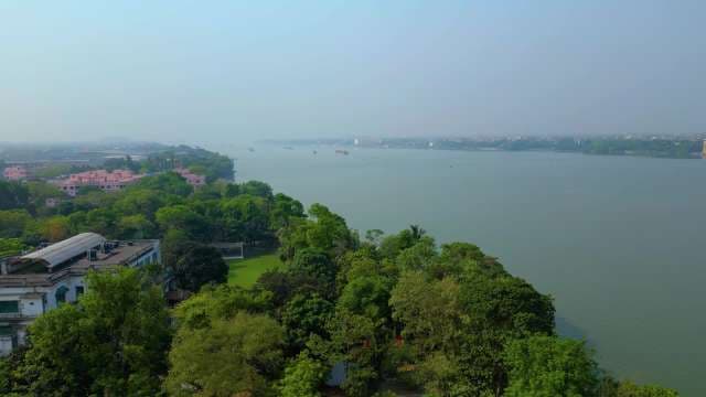 Breathtaking Aerial View of the Hooghly River and Lush Kolkata Landscape