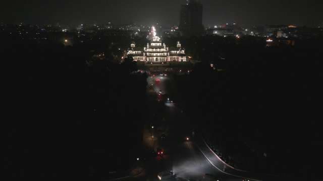 Aerial Night View of the Illuminated Vidhana Soudha in Bengaluru, India