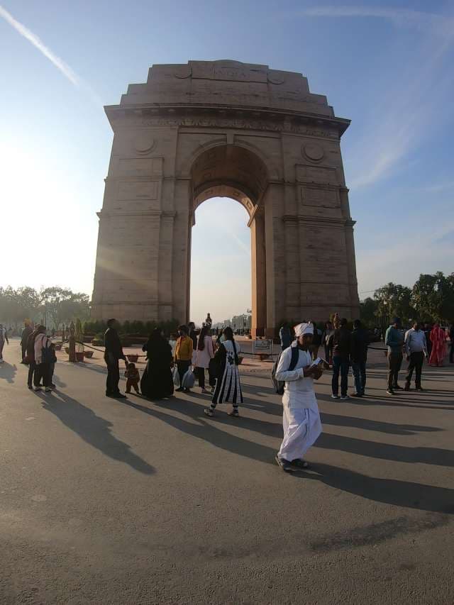 Majestic India Gate Monument and Vibrant Tourist Crowds in New Delhi