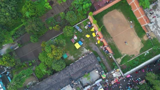 Aerial View of a Vibrant Community Market and Local Sports Court