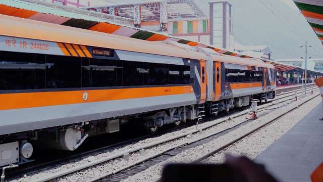 Modern Saffron Vande Bharat Express Train at Indian Railway Station