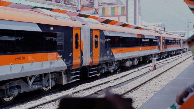 Modern Saffron Vande Bharat Express Train at Indian Railway Station