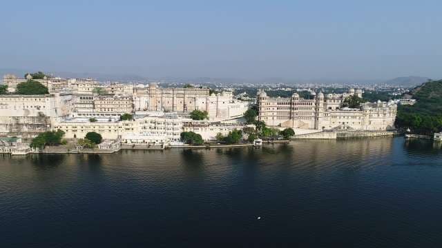 Majestic Aerial View of Udaipur City Palace on Lake Pichola India